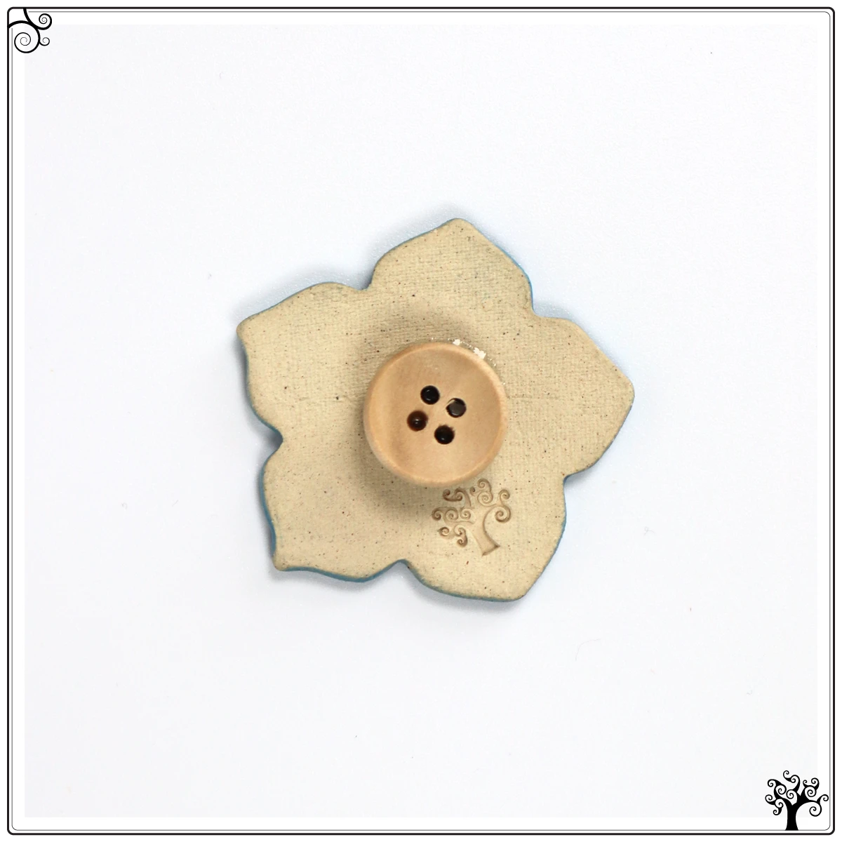 ceramic needle minder turquoise flower
