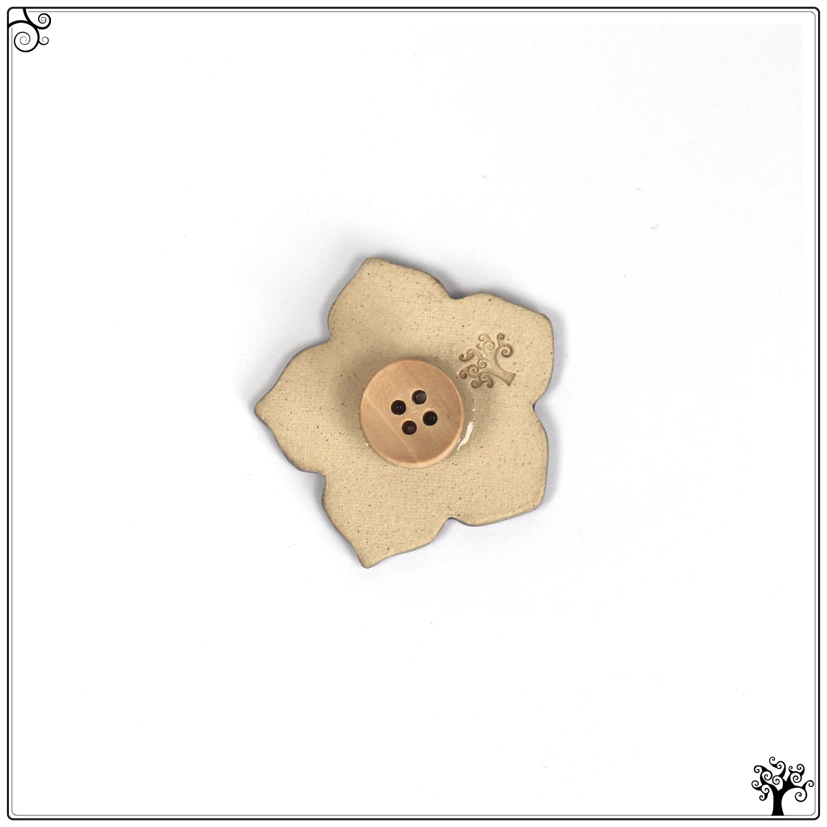 ceramic needle minder purple flower