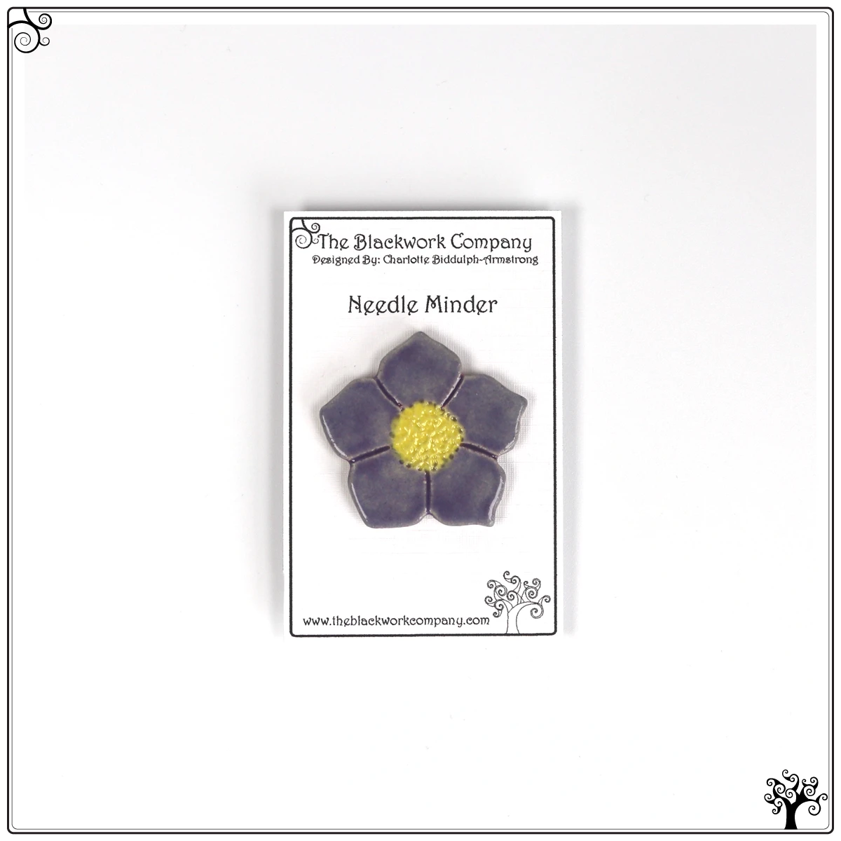 ceramic needle minder purple flower
