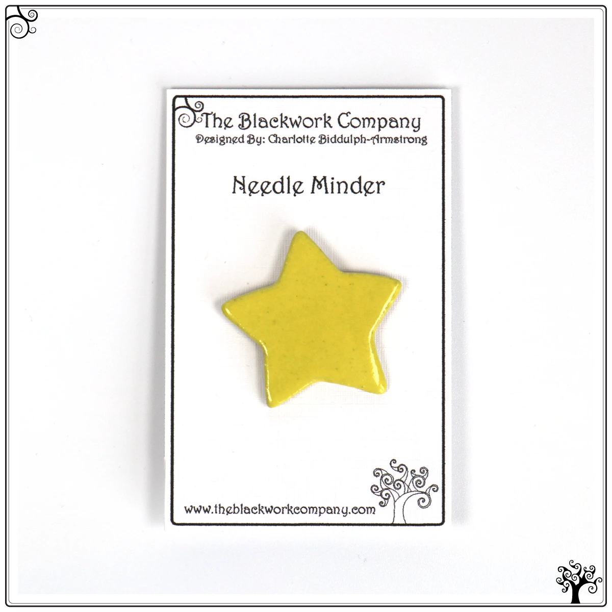 ceramic needle minder yellow star